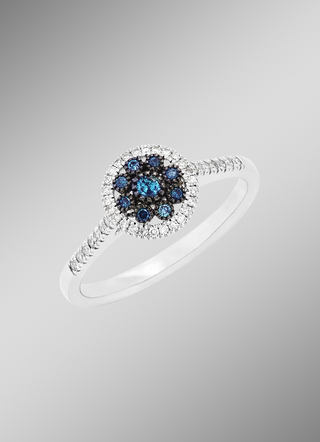 Prachtige damesring met blauwe diamanten en witte diamanten